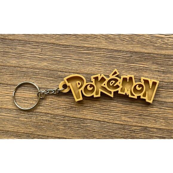 Pokémon-Inspired Keychain | Muted Gold | 3D Printed Collectible - Picture 2 of 2